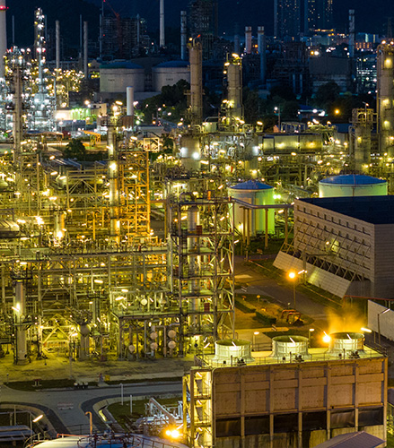 Oil tanks and big factory during night